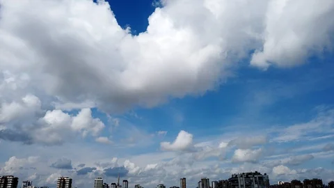Apartment roofs and clouds motion lapse video. Stock Footage 128038241