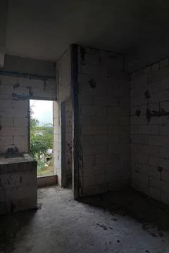 Apartment rooms while under construction whose cement is still visible 스톡 사진
