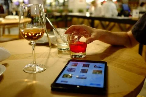 Aperitive with a friend Stock Photos
