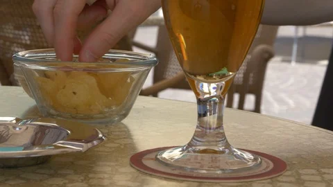 Aperitivo time with chips and beer Stock Footage 89326223