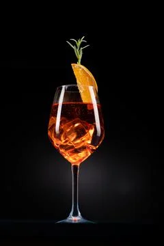 An Aperol Spritz with ice on the table Stock Photos