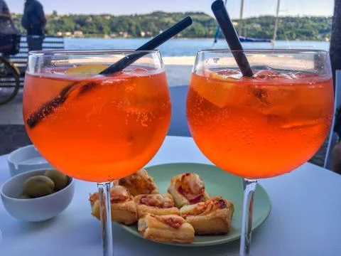 Aperol Spritz with snacks Stock Photos