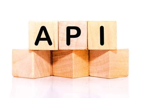 API abbreviation, modern technology concept. API on wooden cubes on a white.. Stock Photos