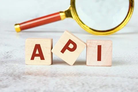 API abbreviation, modern technology concept. API written on wooden cubes wi.. Foto stock