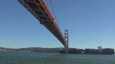 APL cargo ship floating under the Golden Gate Bridge Stock Footage 48398581