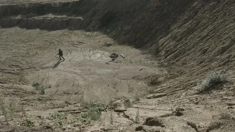 Apocalypse. A lonely warrior wanders through the wasteland. Stock Footage 95417058