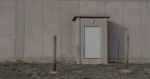 Apocalyptic Bunker Door Medium Shot 4k 24p Stock Footage 100482691