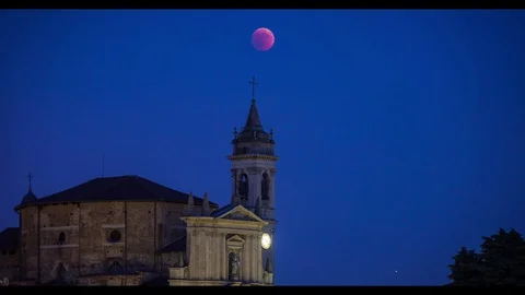 Apocalyptic red moon time lapse over the church of Trezzo sull'Adda Stock Footage 92951291