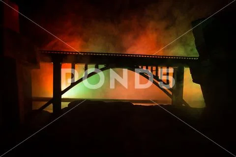 Apocalyptic ruins of the city. Disaster effect. Night scene. City destroyed b Stock Photos