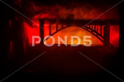Apocalyptic ruins of the city. Disaster effect. Night scene. City destroyed b Stock Photos