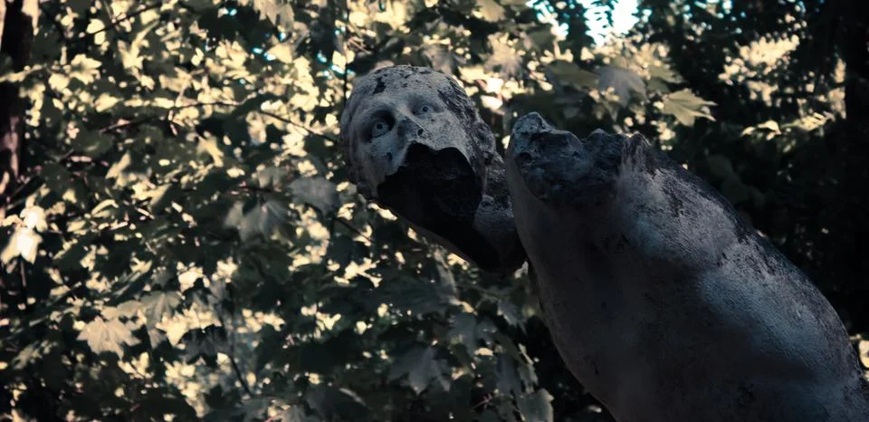 Apocalyptic statue in forrest Stock Photos