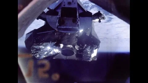 Apollo 10 command module and lunar module during lunar orbital rendezvous Stock Footage 263452356