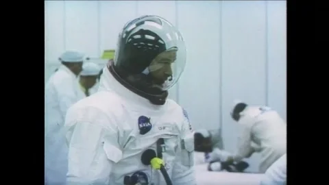 Apollo 11 Astronaut Michael Collins suiting up for spaceflight to the moon Stock Footage 269506613