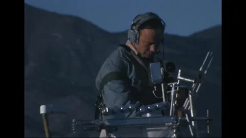 Apollo 14 Astronaut Edgar Mitchell geology training at volcanic site Stock Footage 274336054