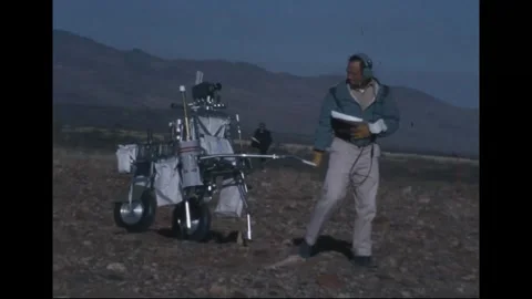 Apollo 14 Astronaut Edgar Mitchell training with Modular Equipment Transporter Stock Footage 274336081