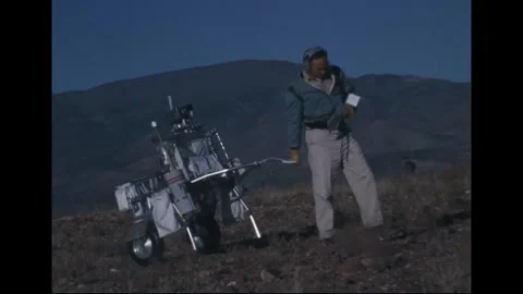 Apollo 14 Astronaut Edgar Mitchell geology training with modular equipment trans Stock Footage 274336209