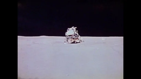 Apollo 15 astronauts stamp an interplanetary letter and drop a hammer and a Stock Footage 95640542