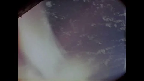 The Apollo 16 spacecraft splashes down, astronauts John Watts Young, Thomas Video stock 86138249