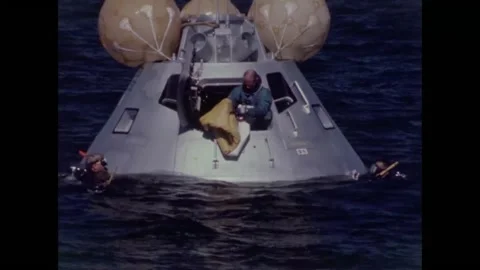 Apollo 8 back-up Buzz Aldrin inflating life-raft during water egress training Stock Footage 271518129