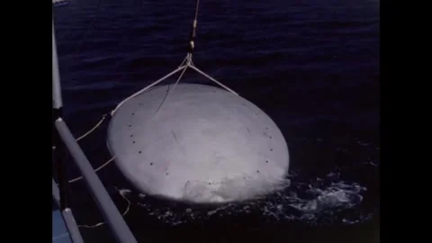 Apollo 8 back-up command module lowered into sea nose-down for egress training Video stock 271518894