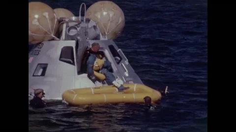 Apollo 8 back-up crew Buzz Aldrin exiting command module into life-raft Stock Footage 271518167