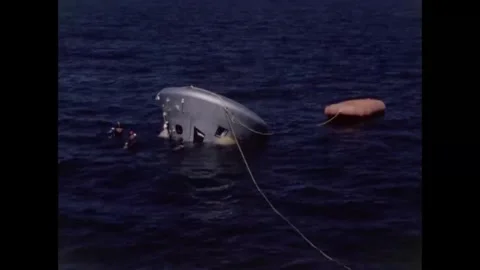  Apollo 8 back-up crew command module nose-down during water egress training Video stock 271518591