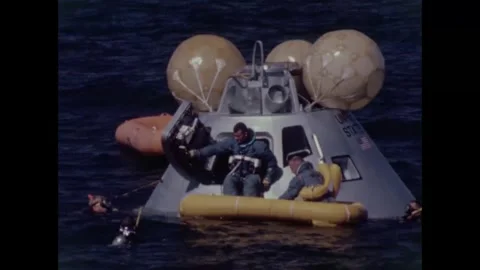 Apollo 8 back-up crew Fred Haize exiting command module into life-raft Stock Footage 271518023