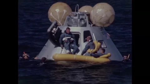 Apollo 8 back-up crew Neil Armstrong exiting command module into life-raft Video stock 271517880