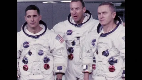 Apollo 8 crew Borman, Anders and Lovell posing in suits Stock Footage 263452521
