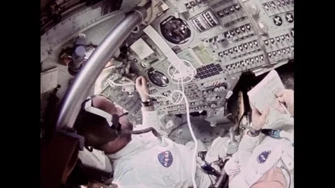 Apollo 9 astronaut James A. McDivitt in-cabin view on-orbit Stock Footage 263452346