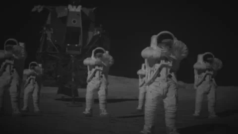 Apollo astronauts dance on the moon's surface with the lander behind them Stock Footage 289764742