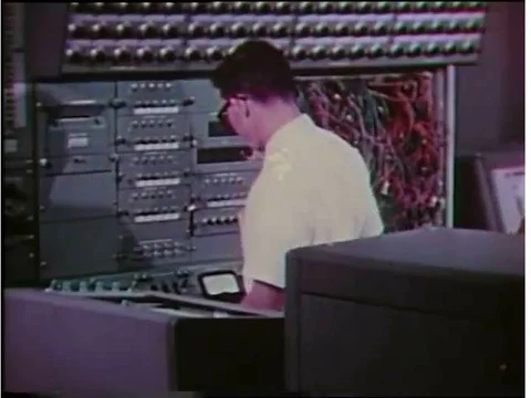 An Apollo Docking Simulation is tested with a model and a computer, in 1969. Stock Footage 74977186