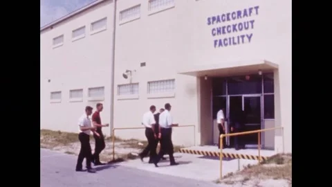 Apollo Program Astronauts arriving at Spacecraft Checkout Facility Stock Footage 263452276