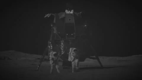 Apollo project and astronauts walk happily on the moon Stock Footage 289778021