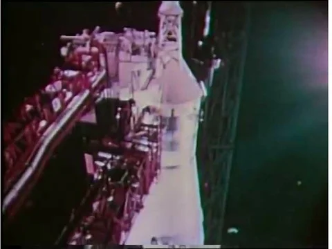 An Apollo rocket launches, Mission Control tracks and astronauts place seismic Stock Footage 75414292