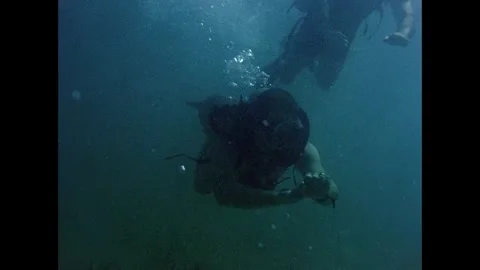 Apollo Space Program astronaut scuba diving training Stock Footage 263453090