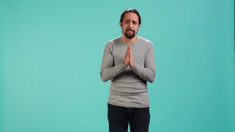 Apologetic person doing sorry gesturing, asking for pardon Stock Footage 323536952