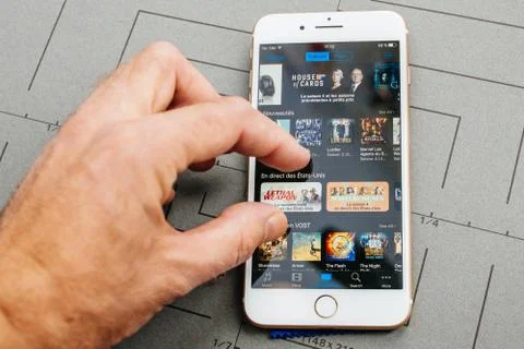 App on Apple iPhone Plus the application software iTunes tv prog Stock Photos