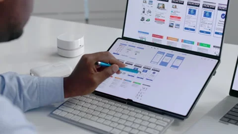 App Developer Carefully Designs User Interface On Laptop Stock Footage 341005206