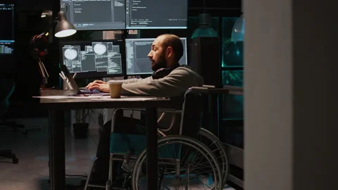 App developer with physical disability working on IT software coding Stock Footage 224579675