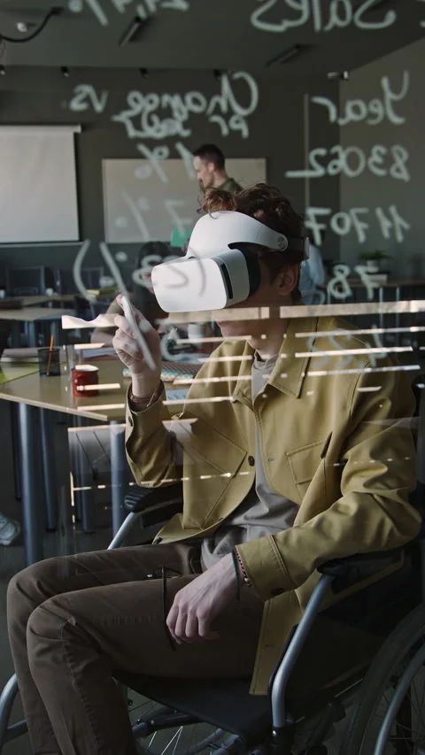 App Developer in Wheelchair Using VR Headset at Work in Office Stock Footage 275070448