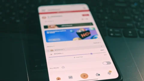 App on mobile phone showing the hash power per second for mining. Mining concept Stock Footage 249887095