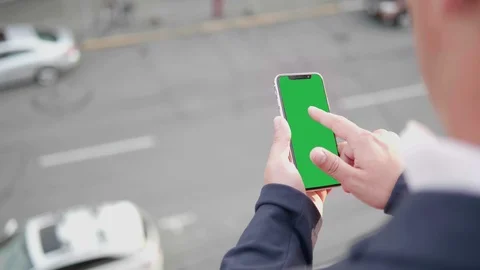 App Mobile Smart Phone on City Street, Business Man People Smartphone Stock Footage 120911341