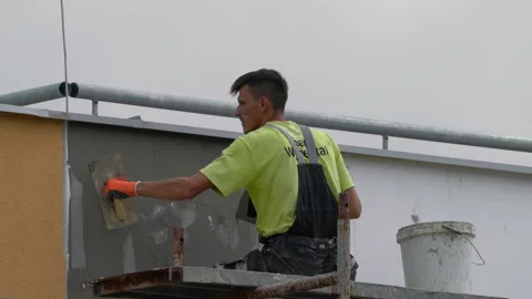 App. second layer glue over plastic netting on facade,B&amp;H, Sarajevo, Aug 3, 2024 Video stock 280971905