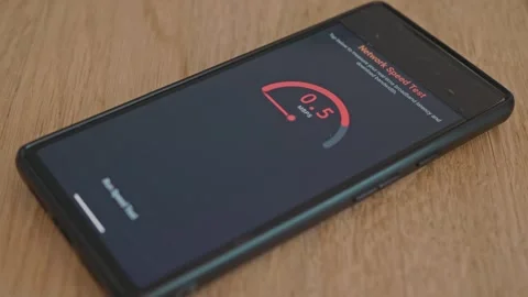 App tests mobile internet speed and issues a warning about very low speeds. Stock Footage 337998446