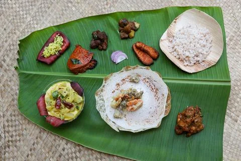 Appam with mutton stew Non-vegetarian sadhya Indian food for Onam sadya Stock Photos