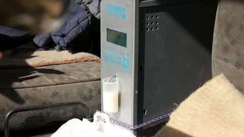 Apparatus for testing milk quality. Stock Footage 76620888