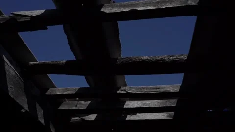 The appearance of Blue Sky through a hole in the roof of the house Stock Footage 240725837