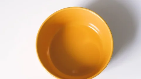 The appearance of Easter eggs in a yellow cup on a white background. easter eggs Stock-Footage 108196746