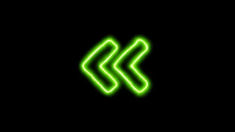 The appearance of the green neon symbol Angle double left. Flicker, In - Out. Stock Footage 100693485
